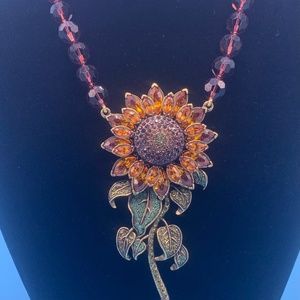 Heidi Daus amber beads and Swarovski crystal sunflower station necklace.